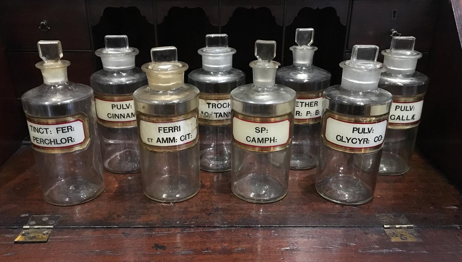 Eight Victorian apothecary bottles